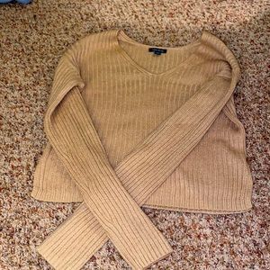 Tannish brown colored sweater perfect for fall and barley used